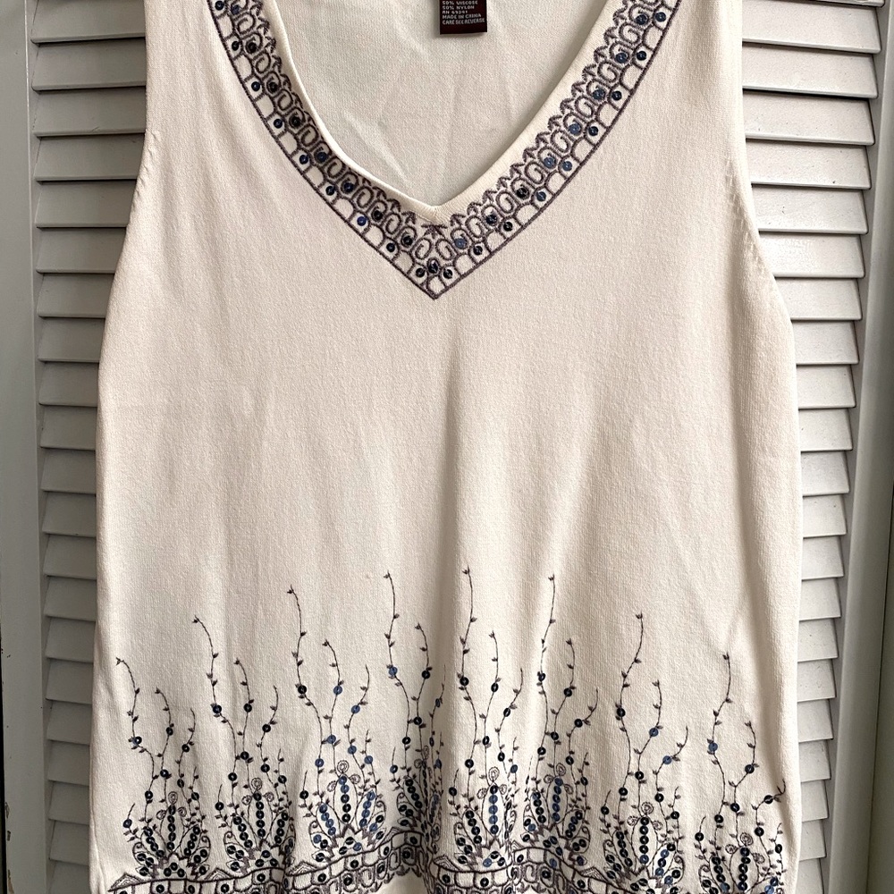 White sleeves top with a lot of detail